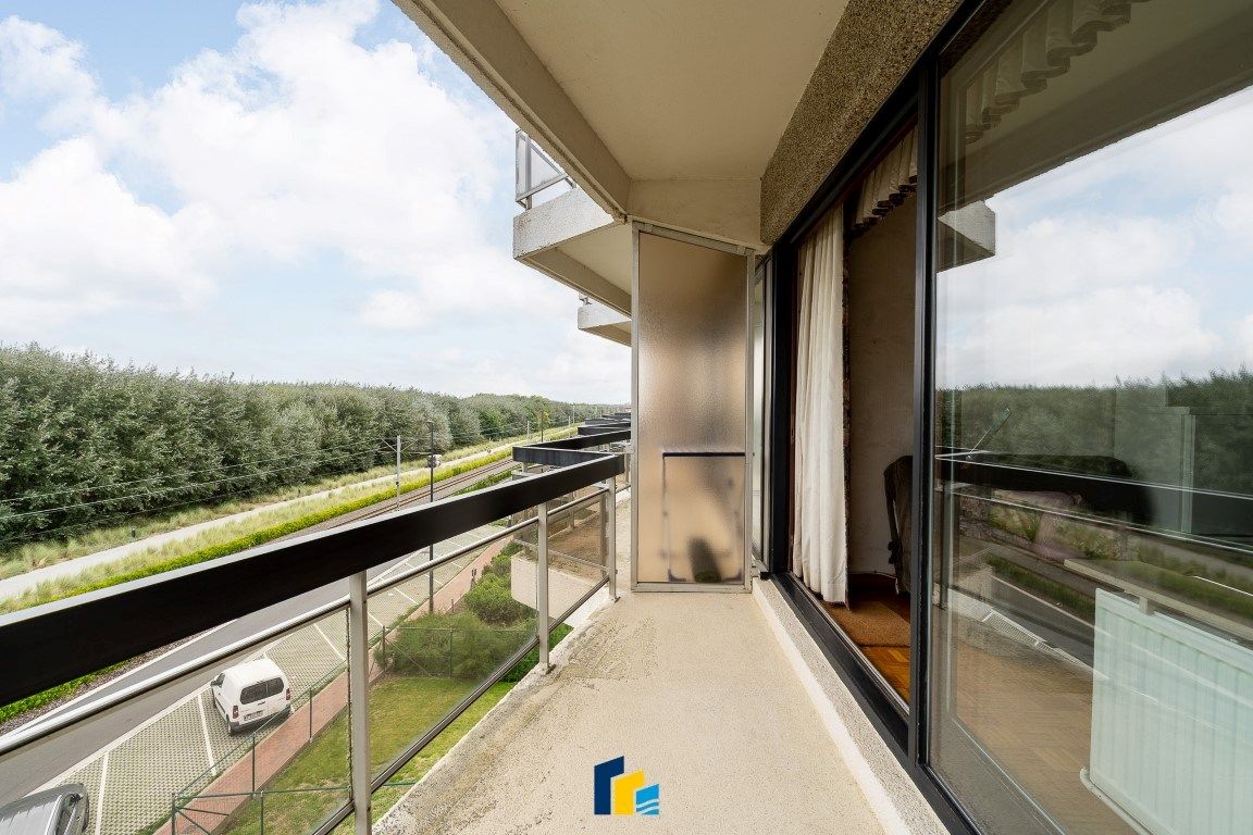 Knusse studio met balkon en zicht op de duinen! foto 12