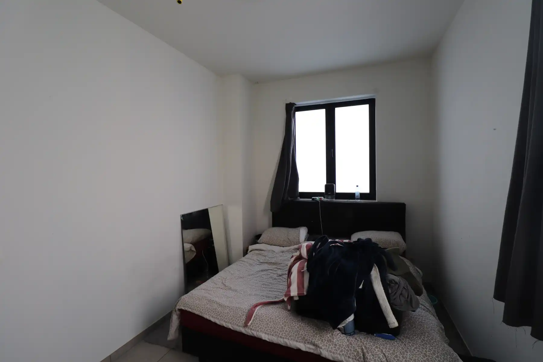 Gelijkvloers appartement met carport en gemeenschappelijke fietsenberging. foto 8