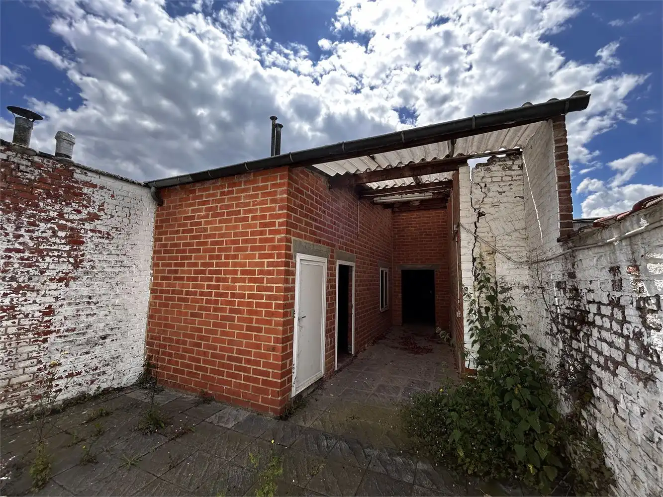 Te renoveren handelshuis met woonst foto 21