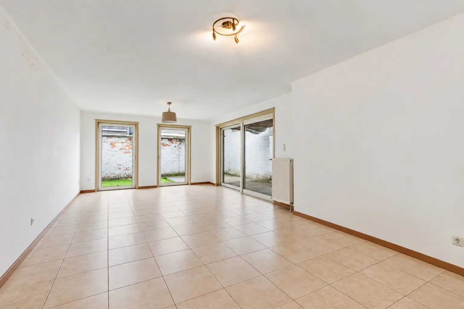 Appartementsgebouw met twee appartementen te koop in Mariakerke foto 2