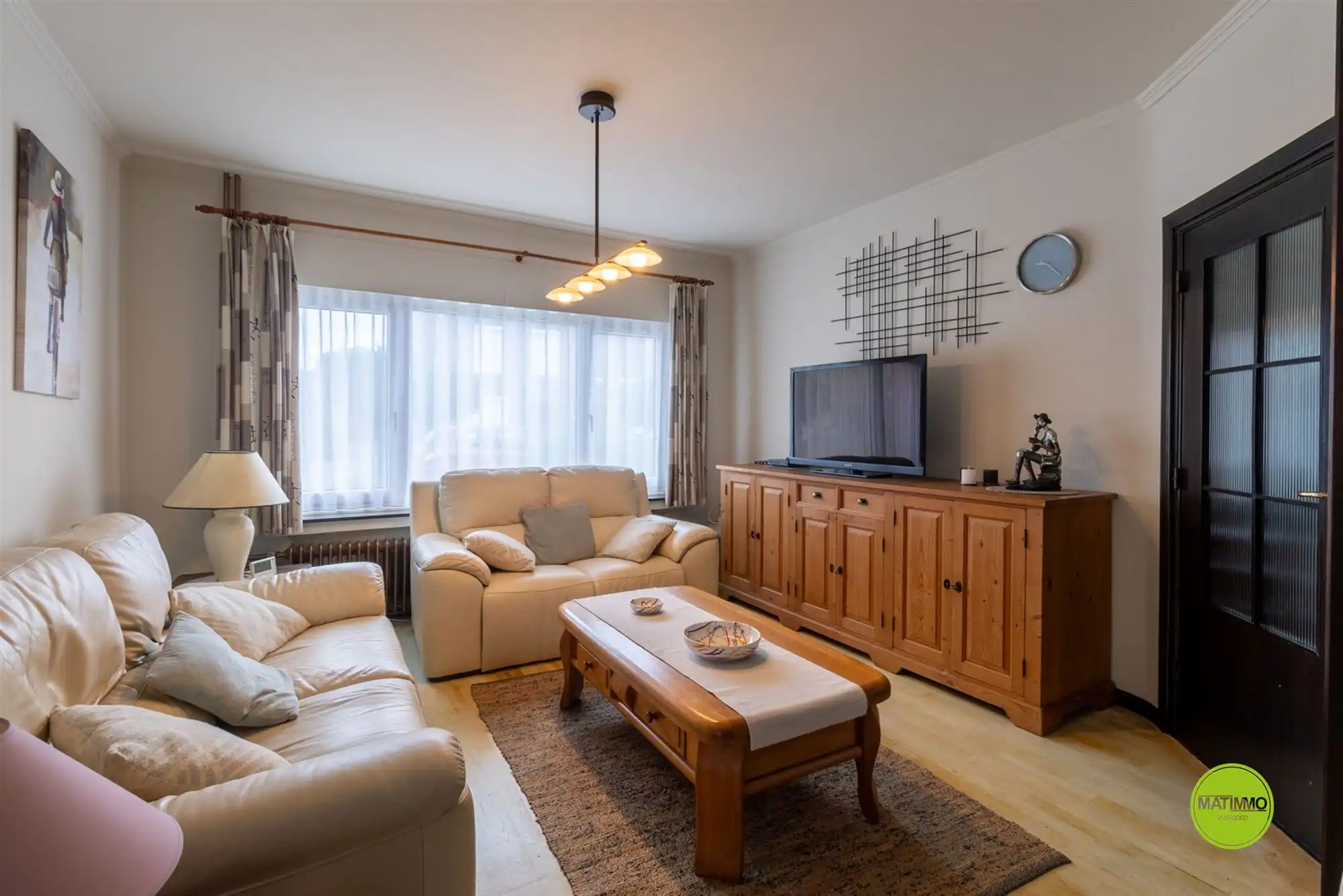Halfopen woning met veel potentieel in het centrum van Bree foto 5