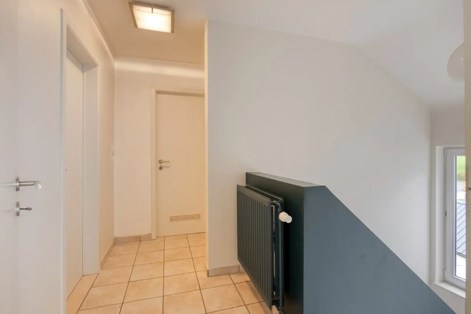 Appartement met 3 slaapkamers, autostaanplaats en terras in het centrum van Lubbeek – EPC 220 kWh/m² - bewoonbare opp. 182 m² foto 10