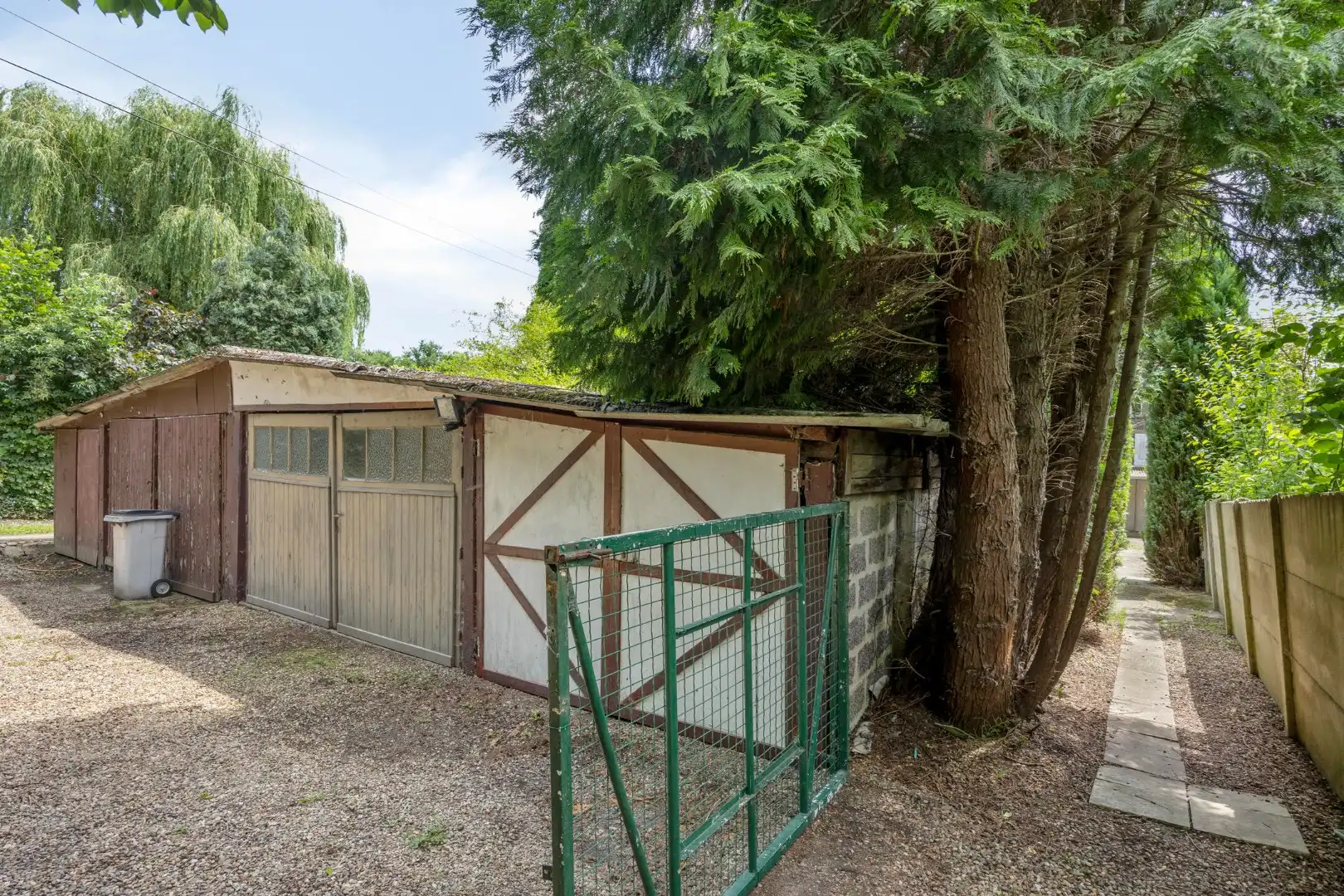 Ruime te renoveren woning met 3 slaapkamers in Lubbeek met doorgang langs het perceel van de buren. EPC: 736 KWH/m² foto 35