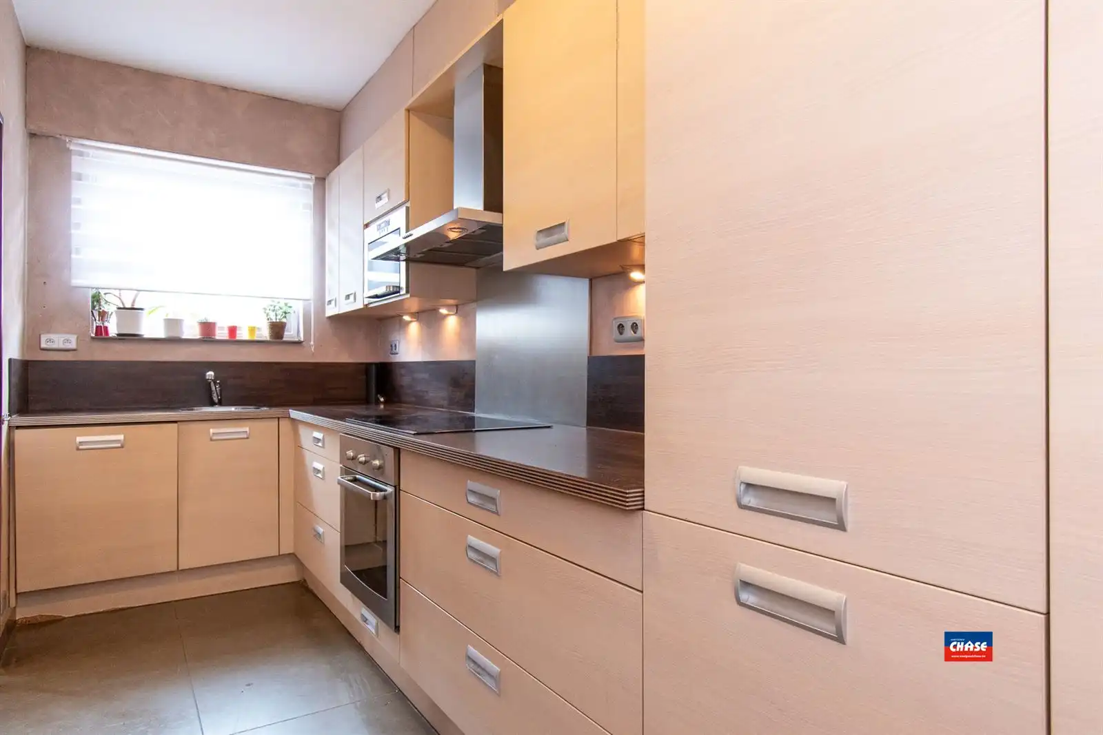 Gelijkvloersappartement met 2 spks, tuin en garage foto 4