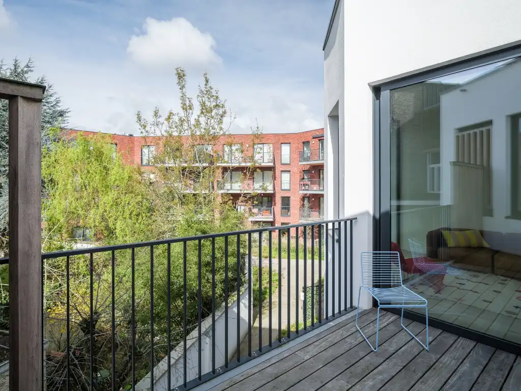 Uniek townhouse-appartement met o.m. 4 slaapkamers, 3 badkamer en een ruim terras. foto 16