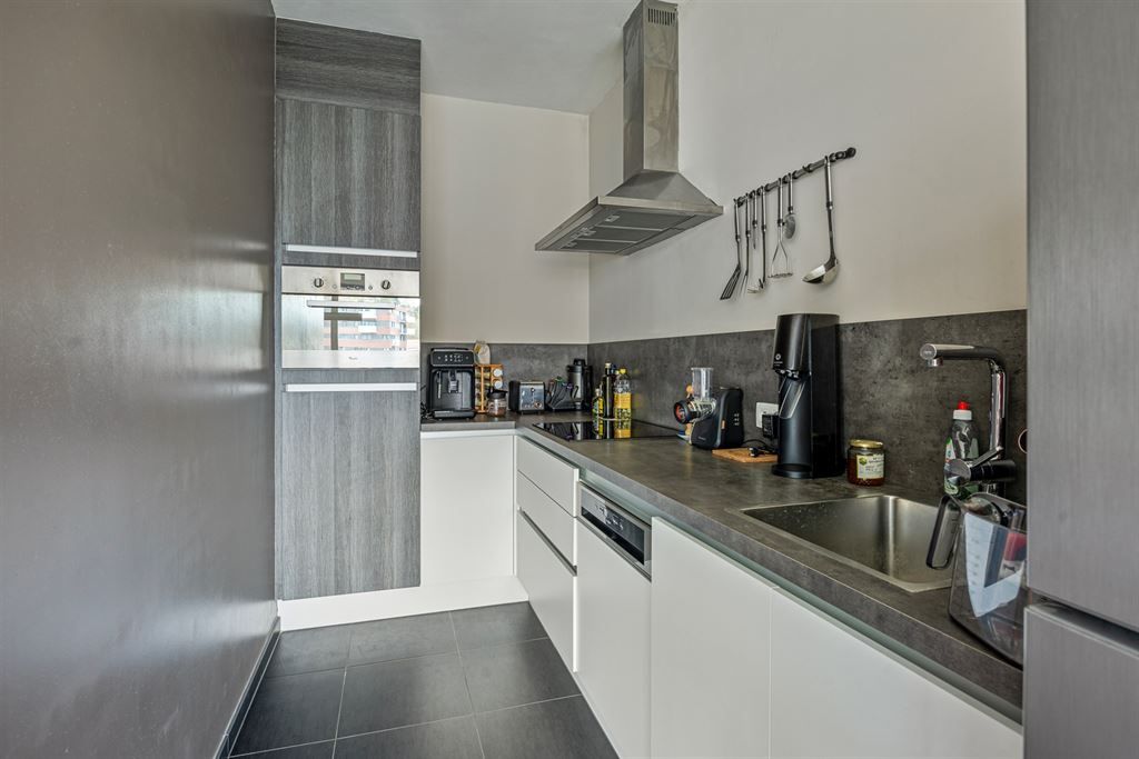Prachtig nieuwbouwappartement met zicht over het Sluispark foto 11