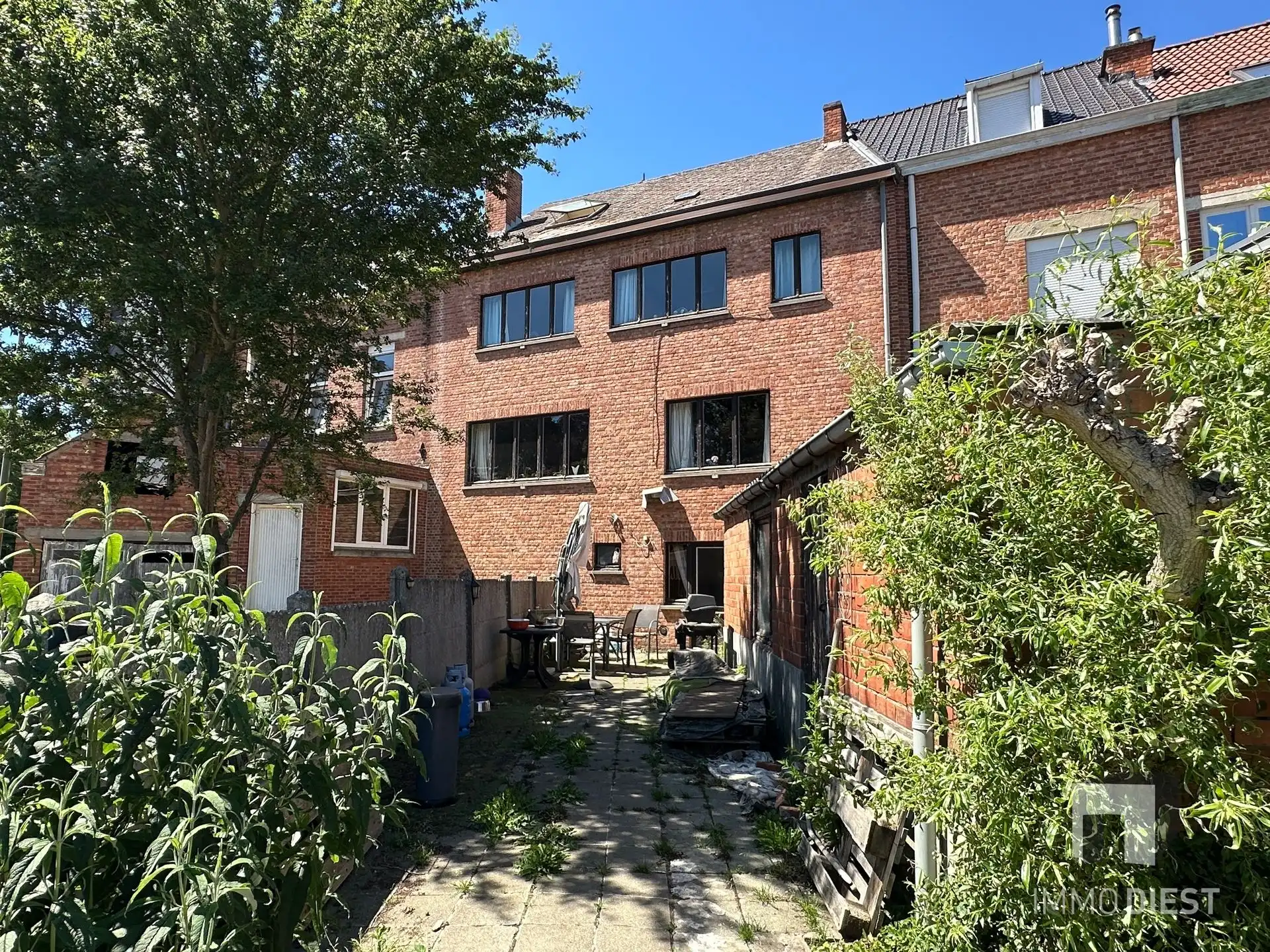 Te renoveren woning met 3 slaapkamers, 2 garages en tuin in Diest foto 33