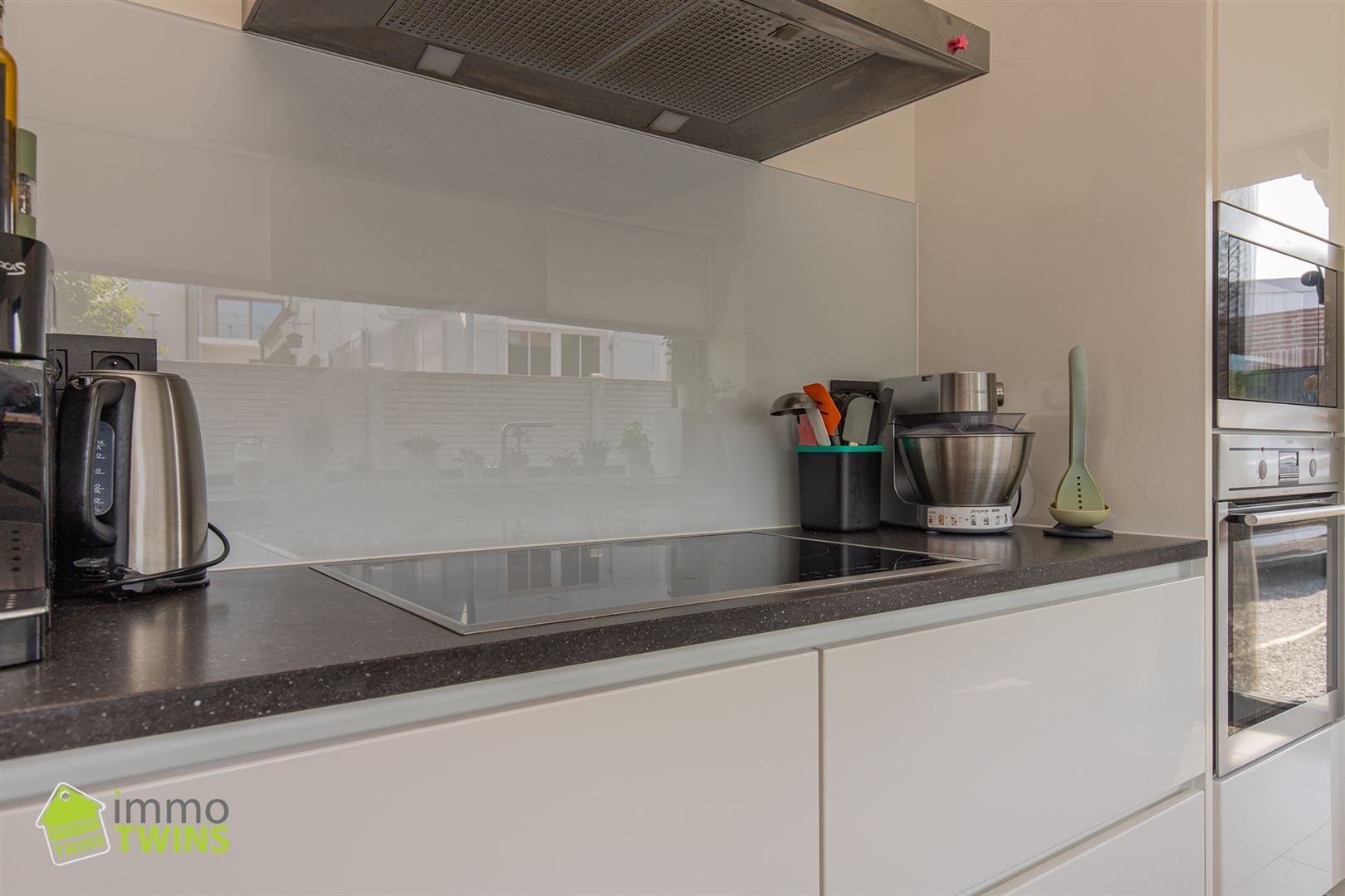 Instapklare woning met strak design te Grembergen foto 11