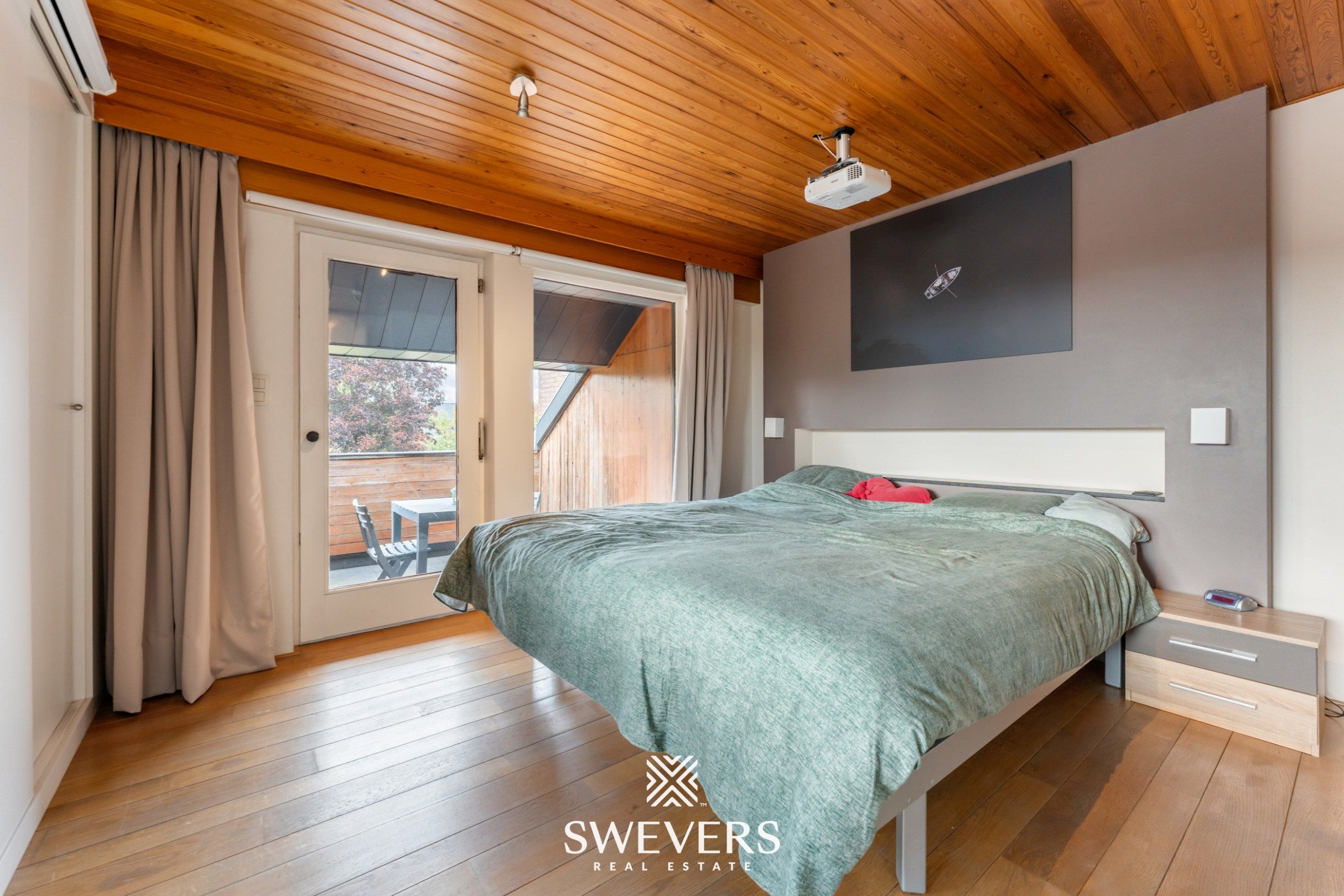 Knusse, hedendaagse gezinswoning met warme indeling en grote, zonnige tuin foto 32