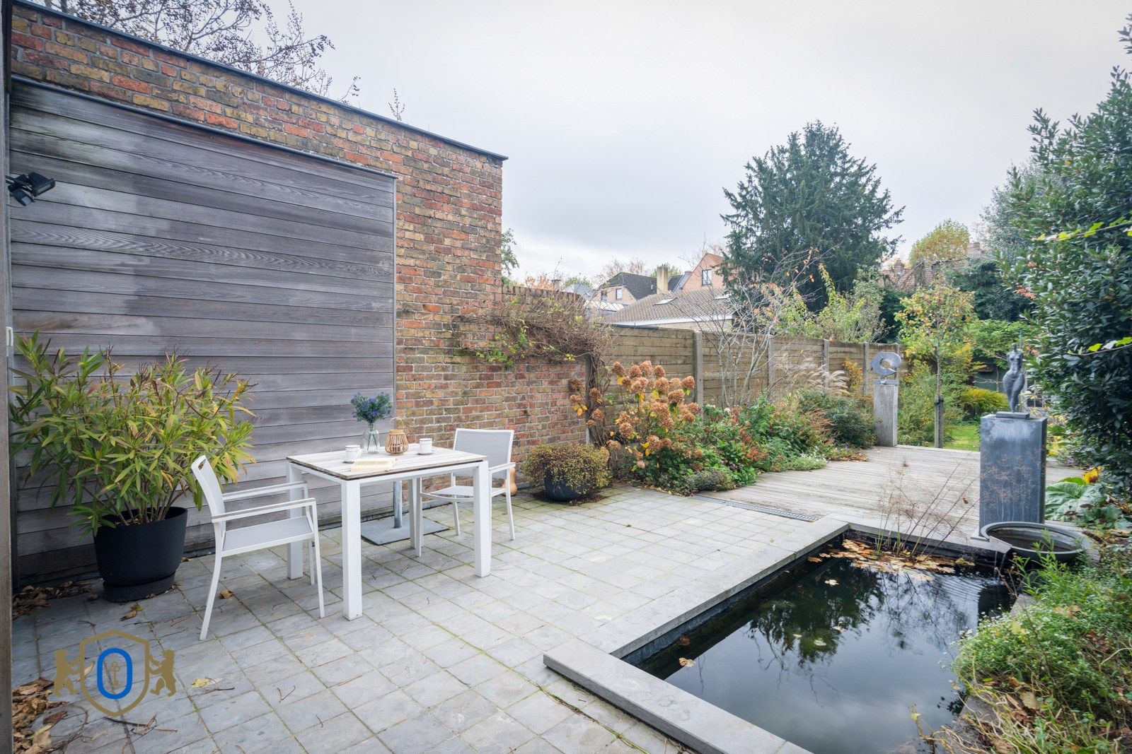 Brugse 3-slpkr herenwoning met studio & romantische tuin foto 16