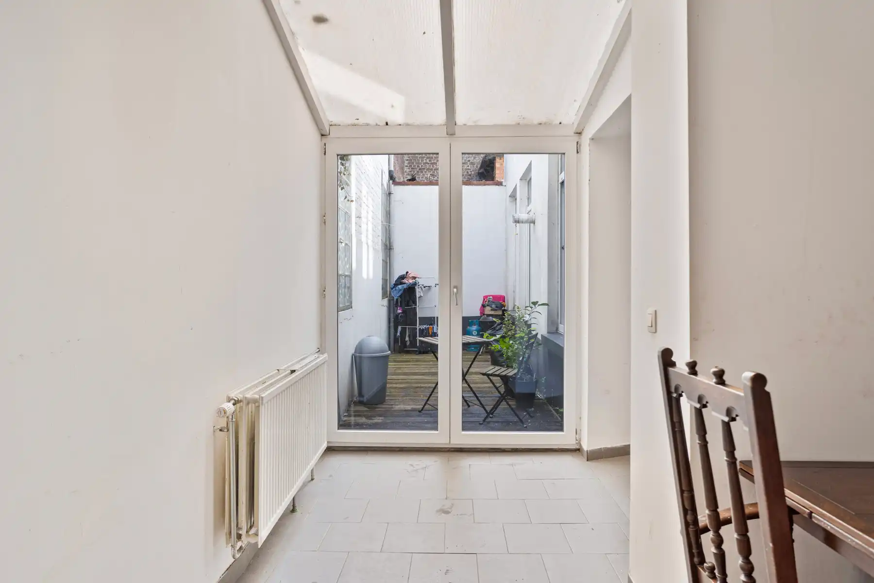 Gelijkvloerse praktijk + leefruimte en koer te centrum Halle foto 16