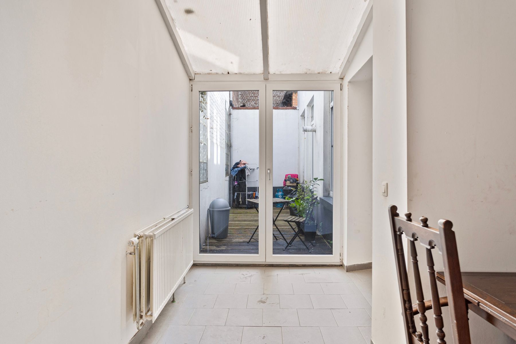 Gelijkvloerse praktijk + leefruimte en koer te centrum Halle foto 16