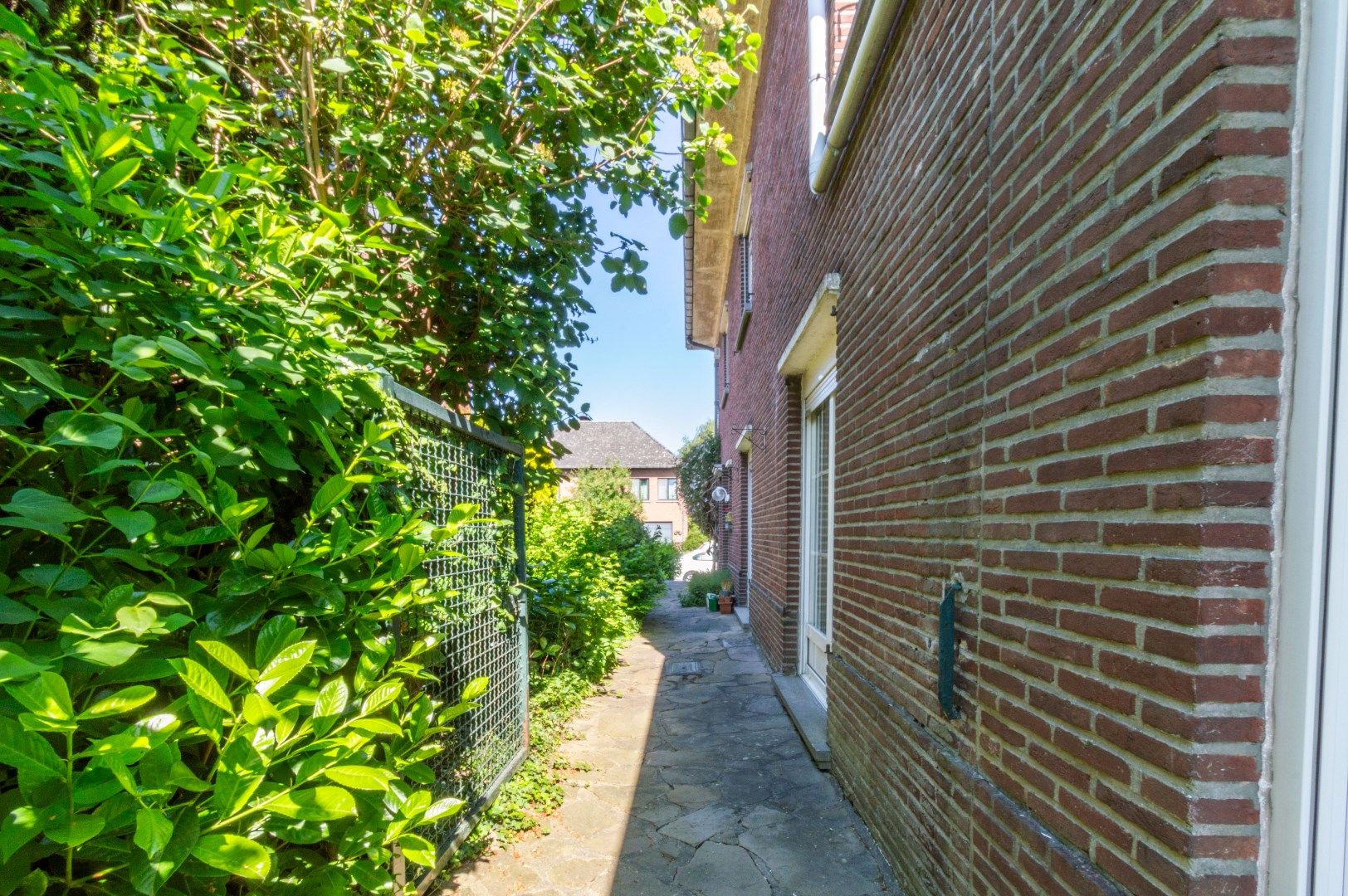 RUIME WONING MET 4 SLAAPKAMERS, GARAGE & ZUID-TUIN ! foto 8