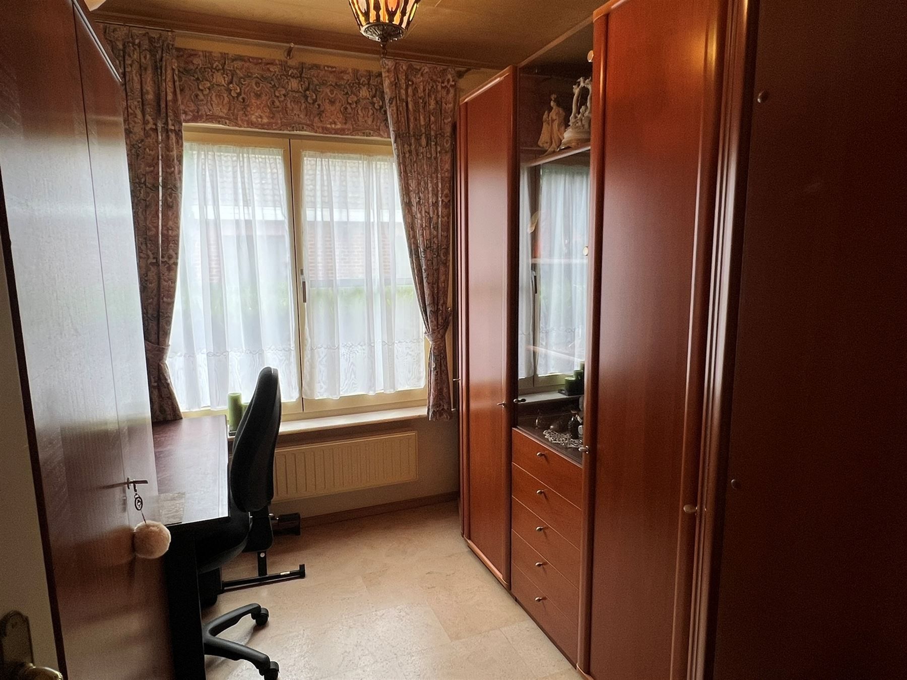Comfortabele woning met een prachtige tuin en praktische bijgebouwen foto 16