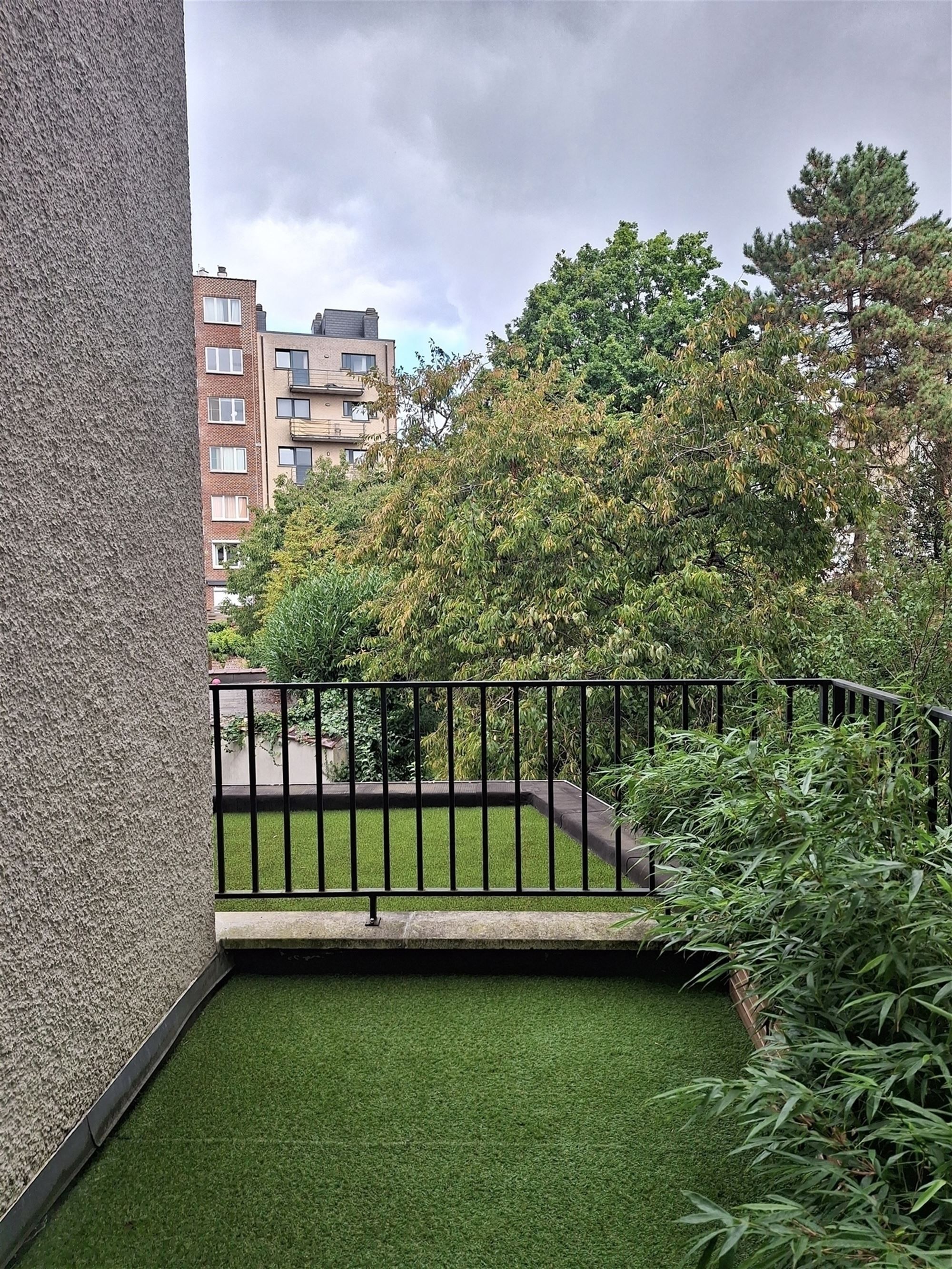 Duplex met tuin en 3/4 slaapkamers foto 24