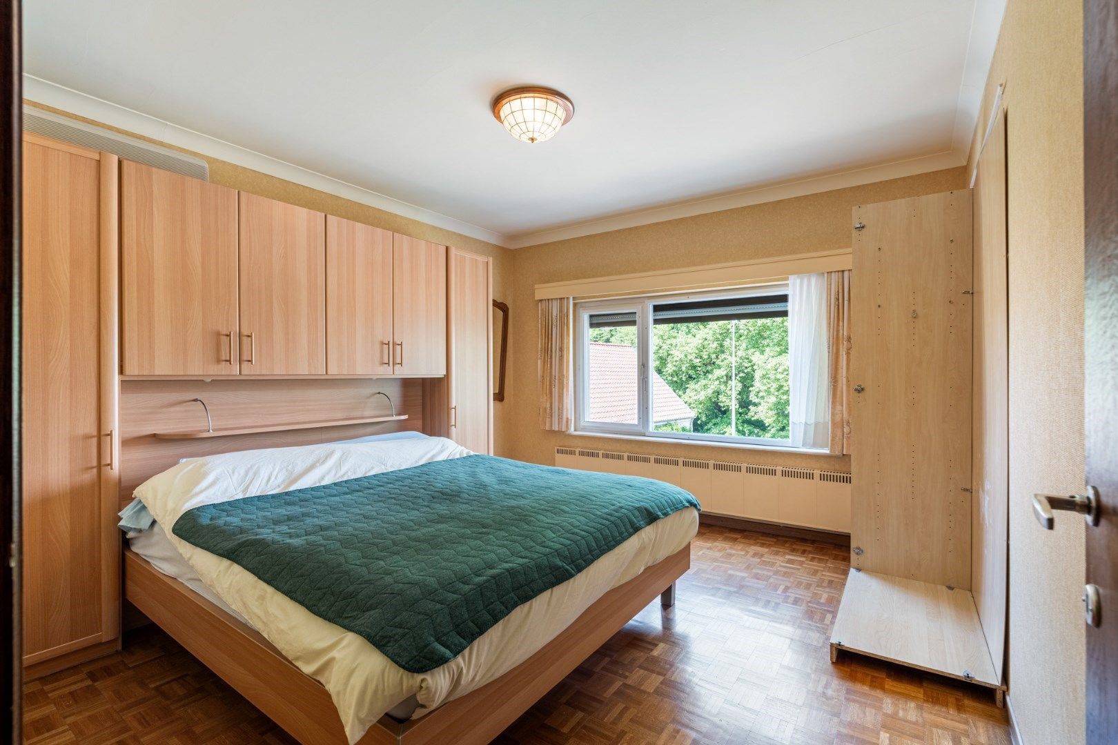 IN OPTIE - Verzorgde vrijstaande woning met mooie tuin op 11a 58ca, op enkele minuutjes van het centrum  foto 15
