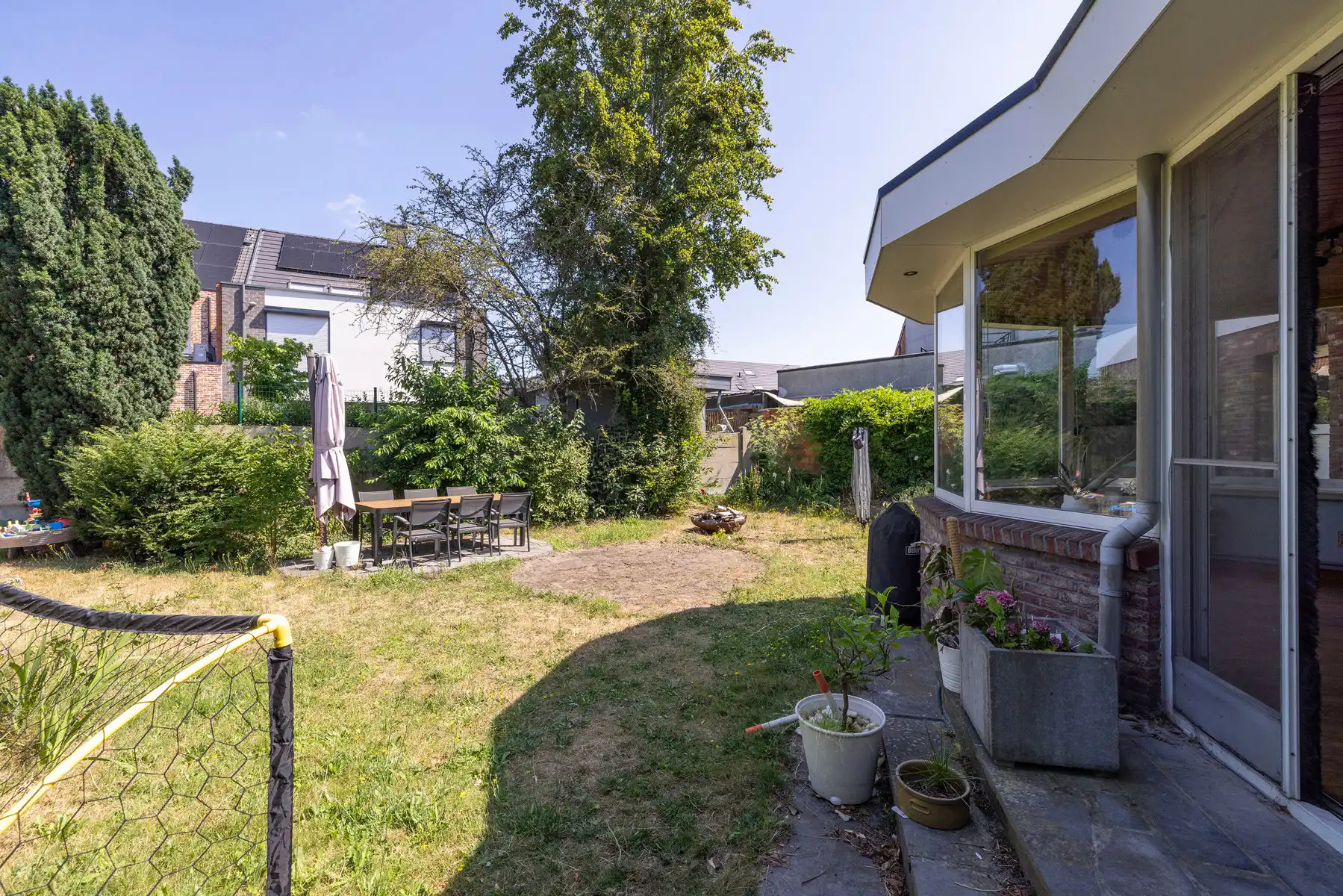 Ruime woning met 4 slpk, 2 bdk, garage en tuin!  foto 8