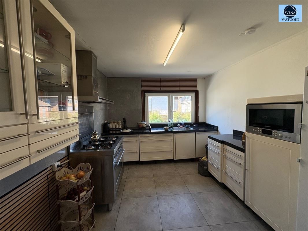 WONING MET HANDELSRUIMTE EN 3 SLAAPKAMERS foto 18