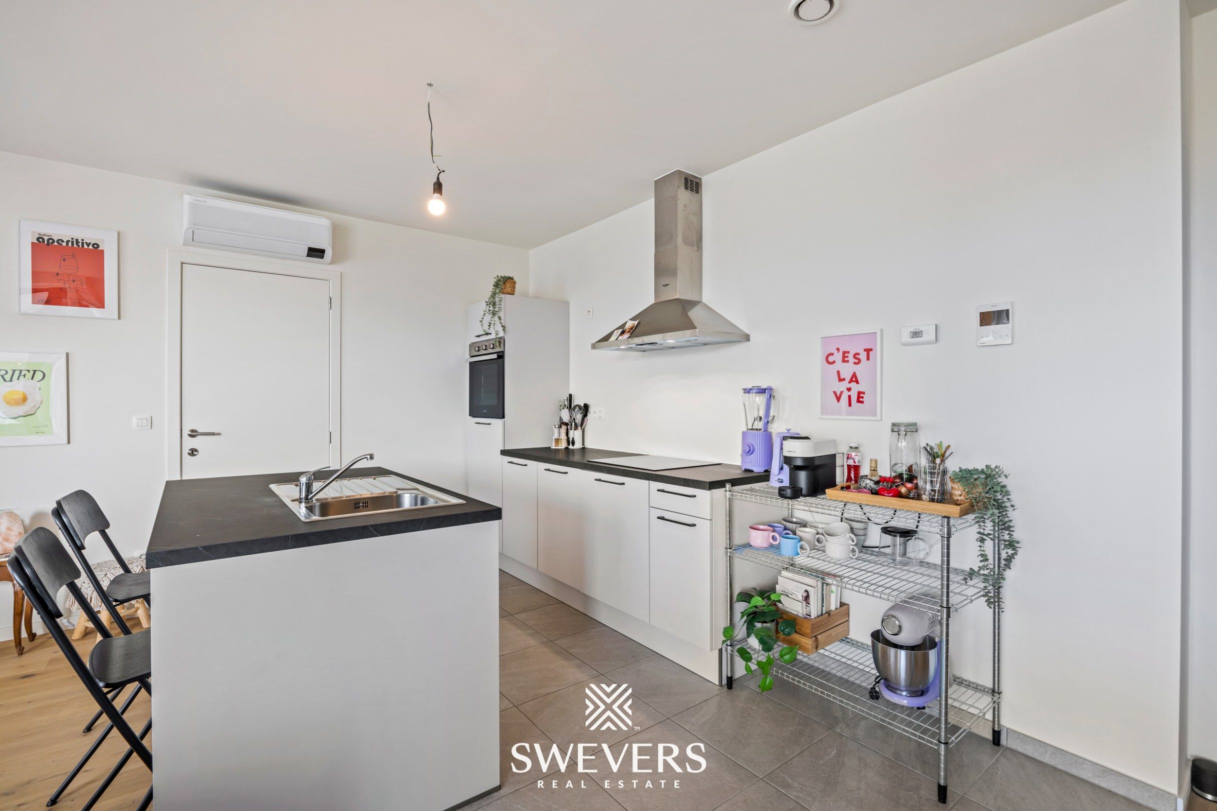 Recent 2 slpk- appartement met autostaanplaats en berging in centrum Beringen foto 7