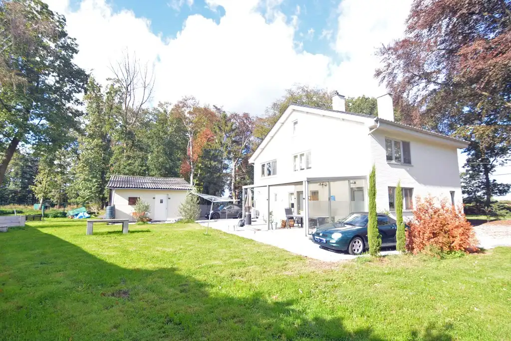 Vrijstaande, energiezuinige woning met 4 slpk en garage op een perceel van 25 a. foto 6