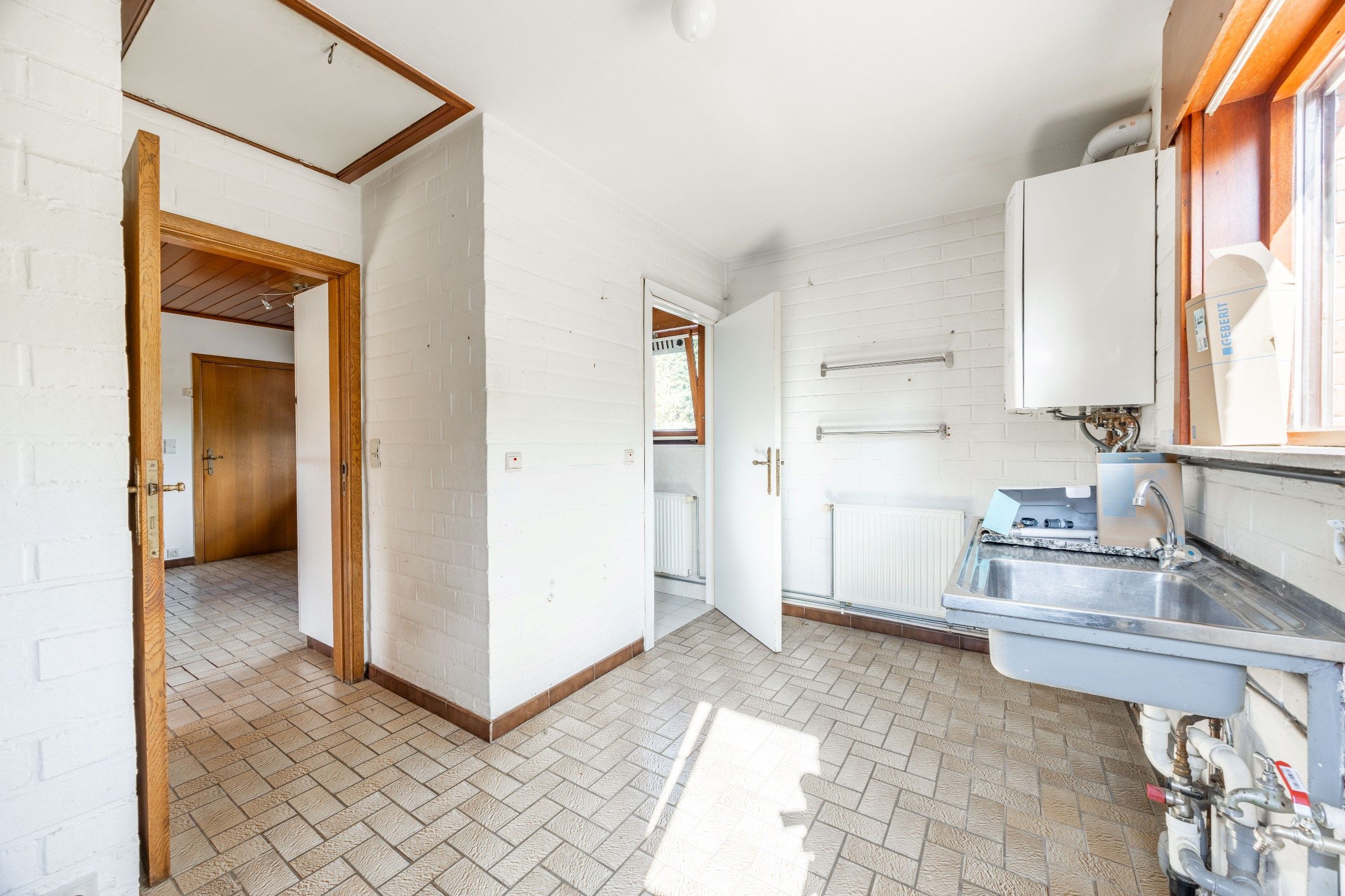 TRAPLOZE WONING MET ZONNIGE TUIN foto 15