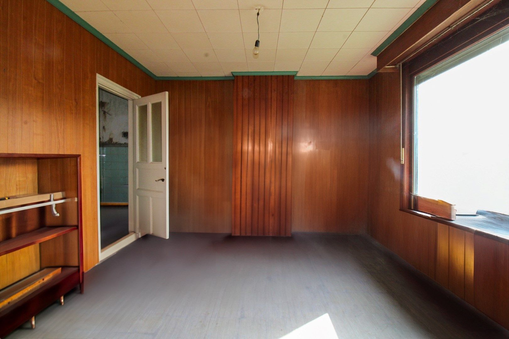 Unieke investeringskans: Halfopen bebouwing met garage, optie tot vijf slaapkamers en groot potentieel op toplocatie te koop in Waasmunster! foto 6