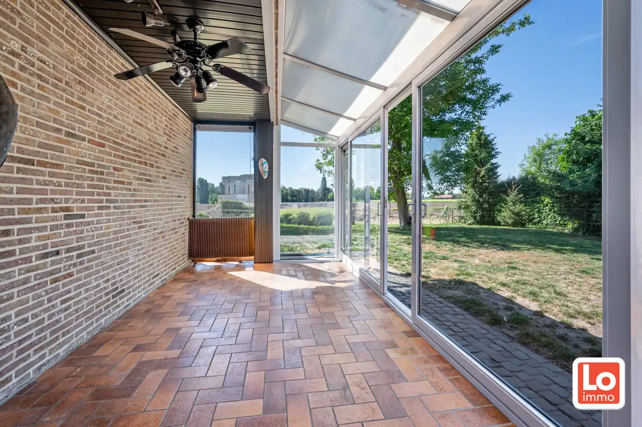 Ruime te renoveren open villa met inpandige garage op een héél rustige toplocatie met open zicht in Lochristi! foto 13