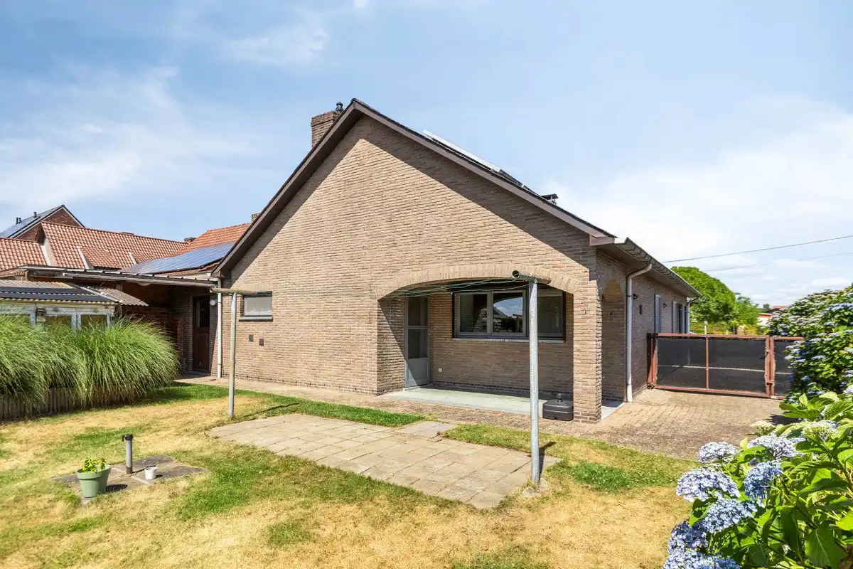 Rustig gelegen gelijkvloers woning met 2 slpks en ruime zolder. foto 16