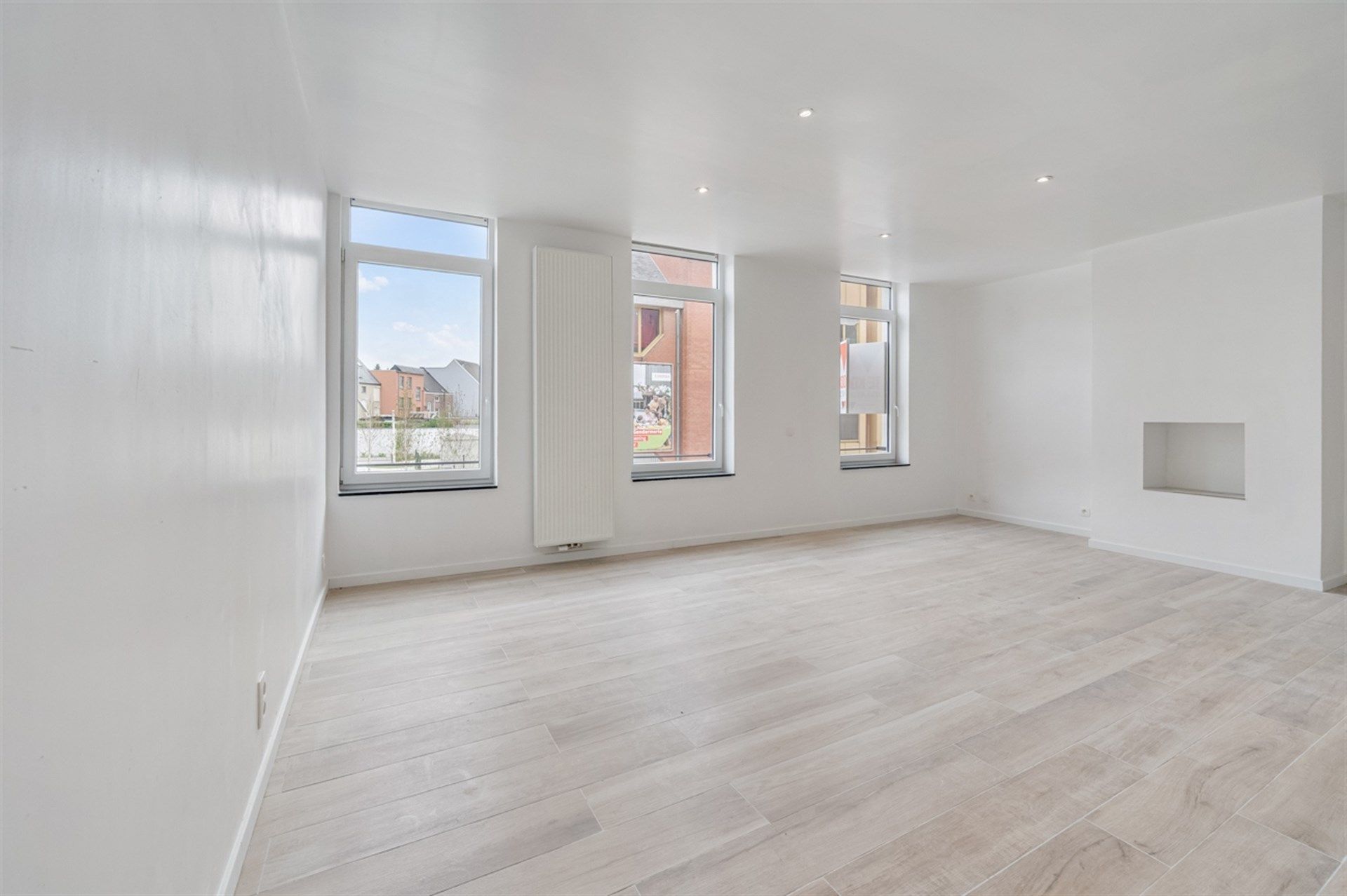 Instapklaar en volledig vernieuwd appartement met ruim terras in het hart van de stad foto 4