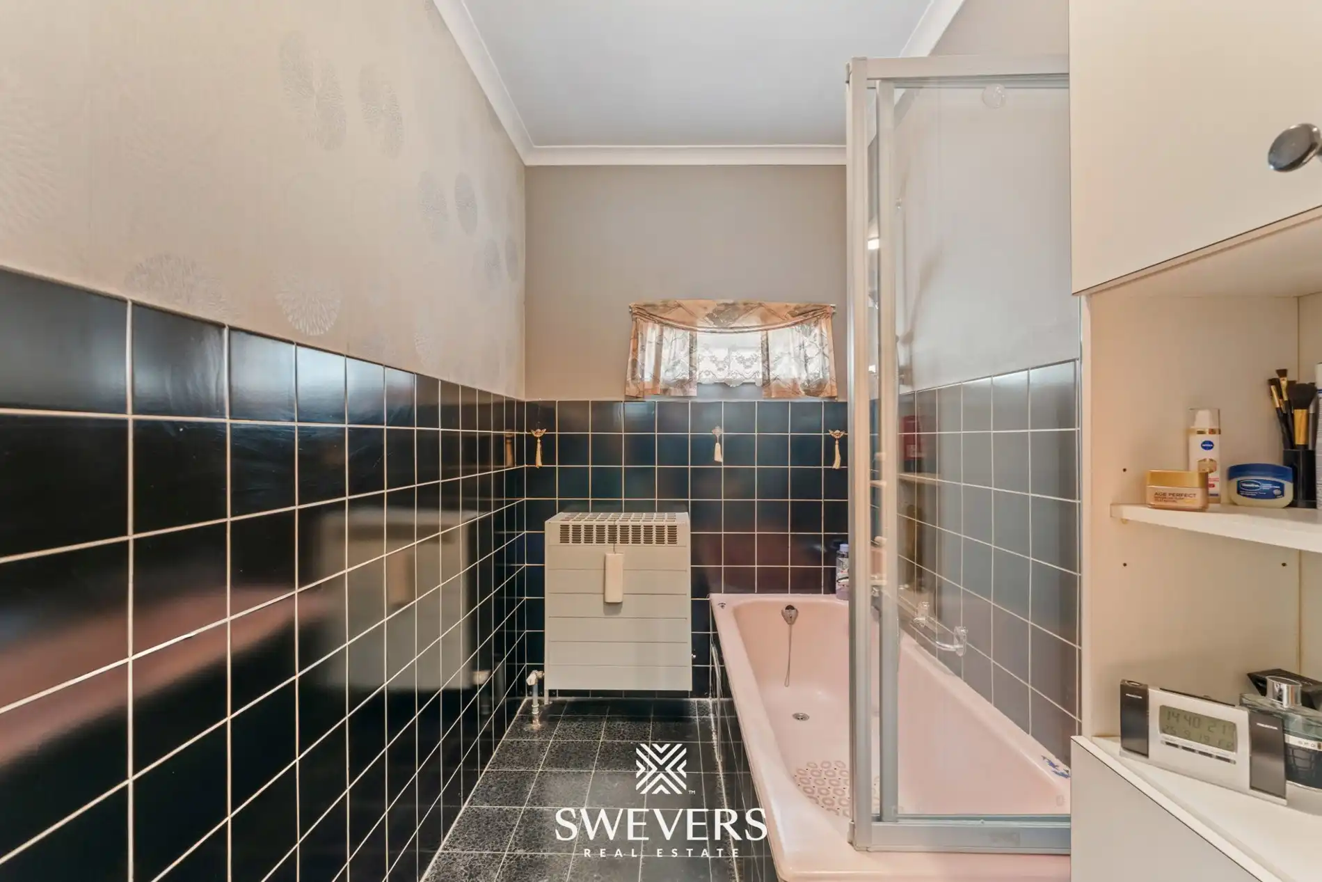 Gelijkvloerse woning met tuin en garage in hartje Tongeren foto 14