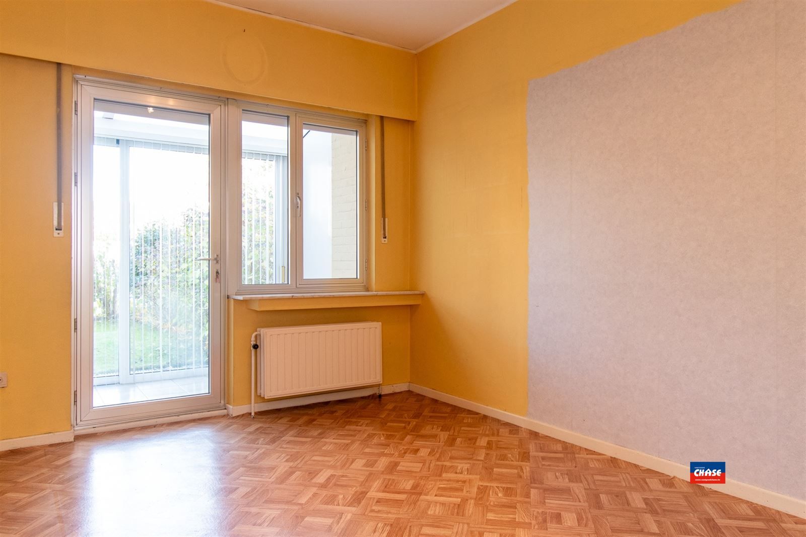 Gelijkvloersapp. met 2 slpks, tuin + garage foto 4