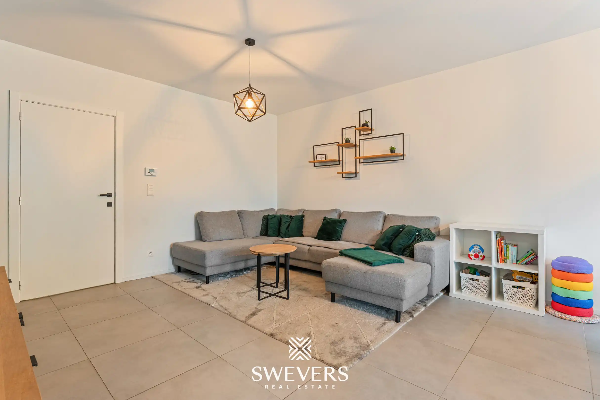 Instapklaar gelijkvloers 2 slpk-appartement met terras en tuin in Heusden. foto 5