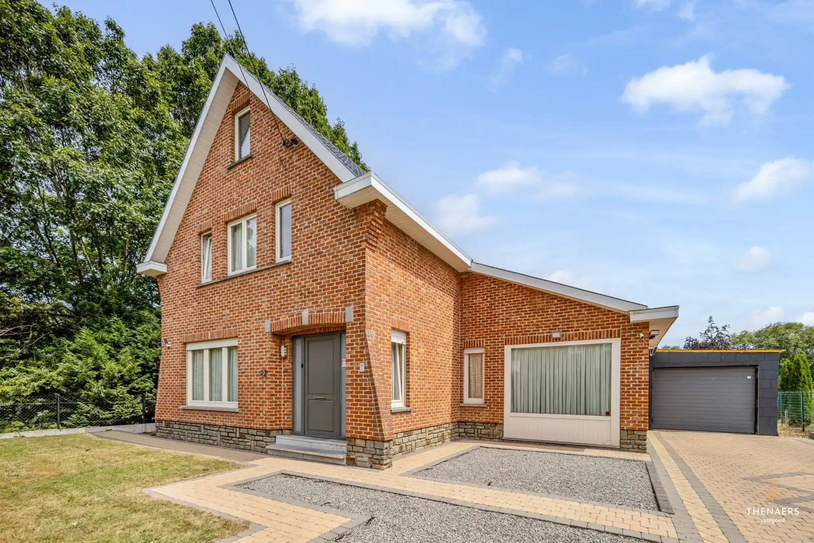 Gezinswoning met drie slaapkamers, garage en aangename buitenruimtes in het landelijke Opheers. foto 29