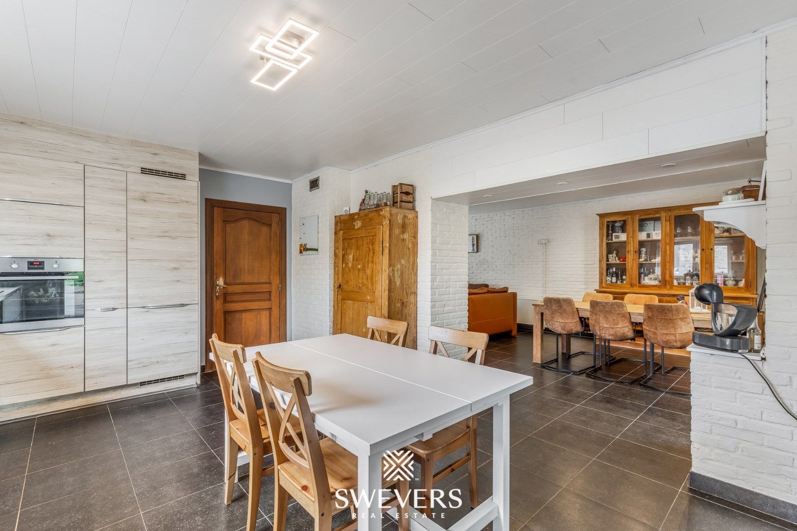 Gezellige woning met veranda, garage & zonnige tuin foto 10