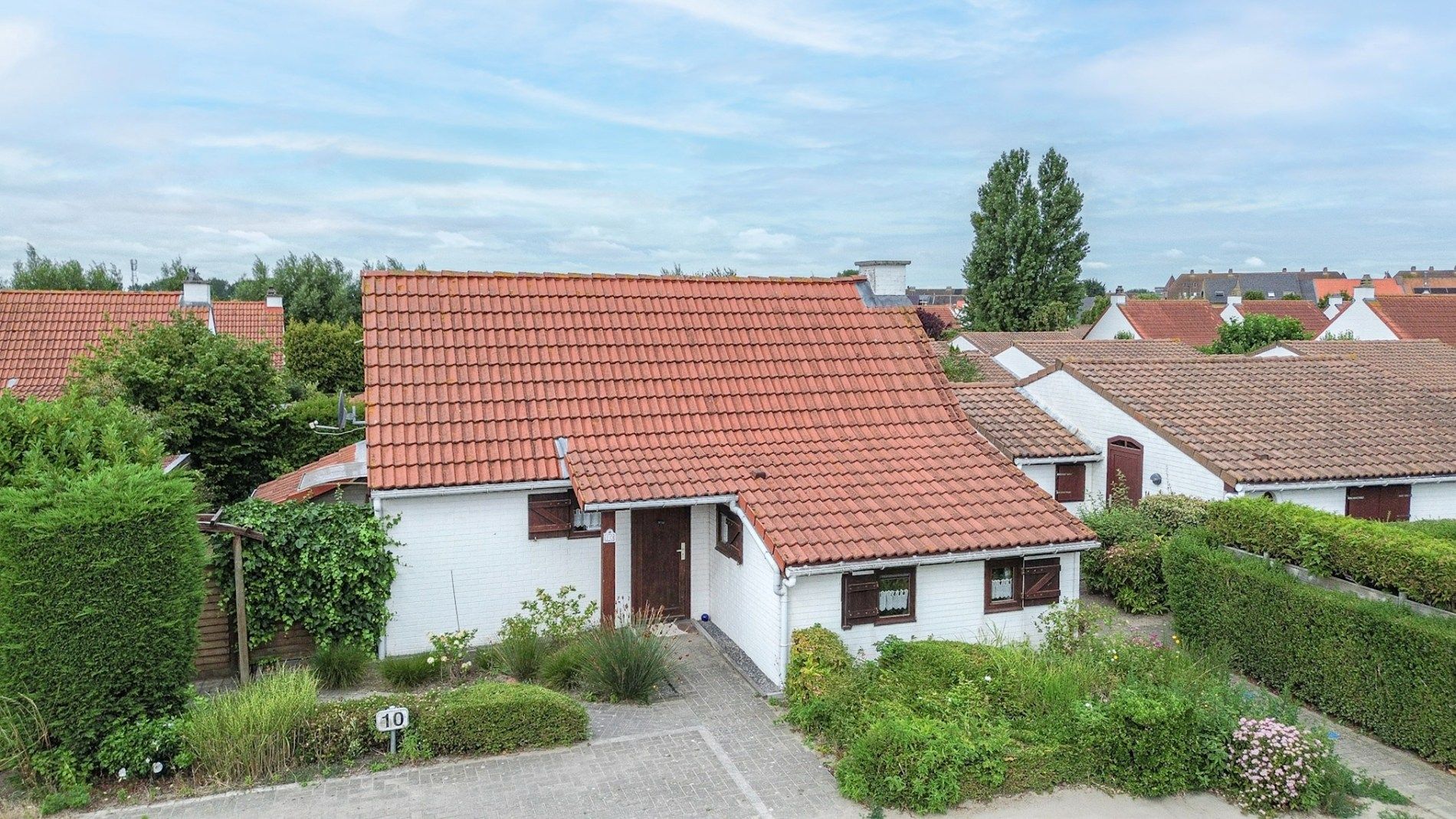 Hoofdfoto van de publicatie: Charmant vissershuis te koop in De Haan – jouw eigen stek aan zee!