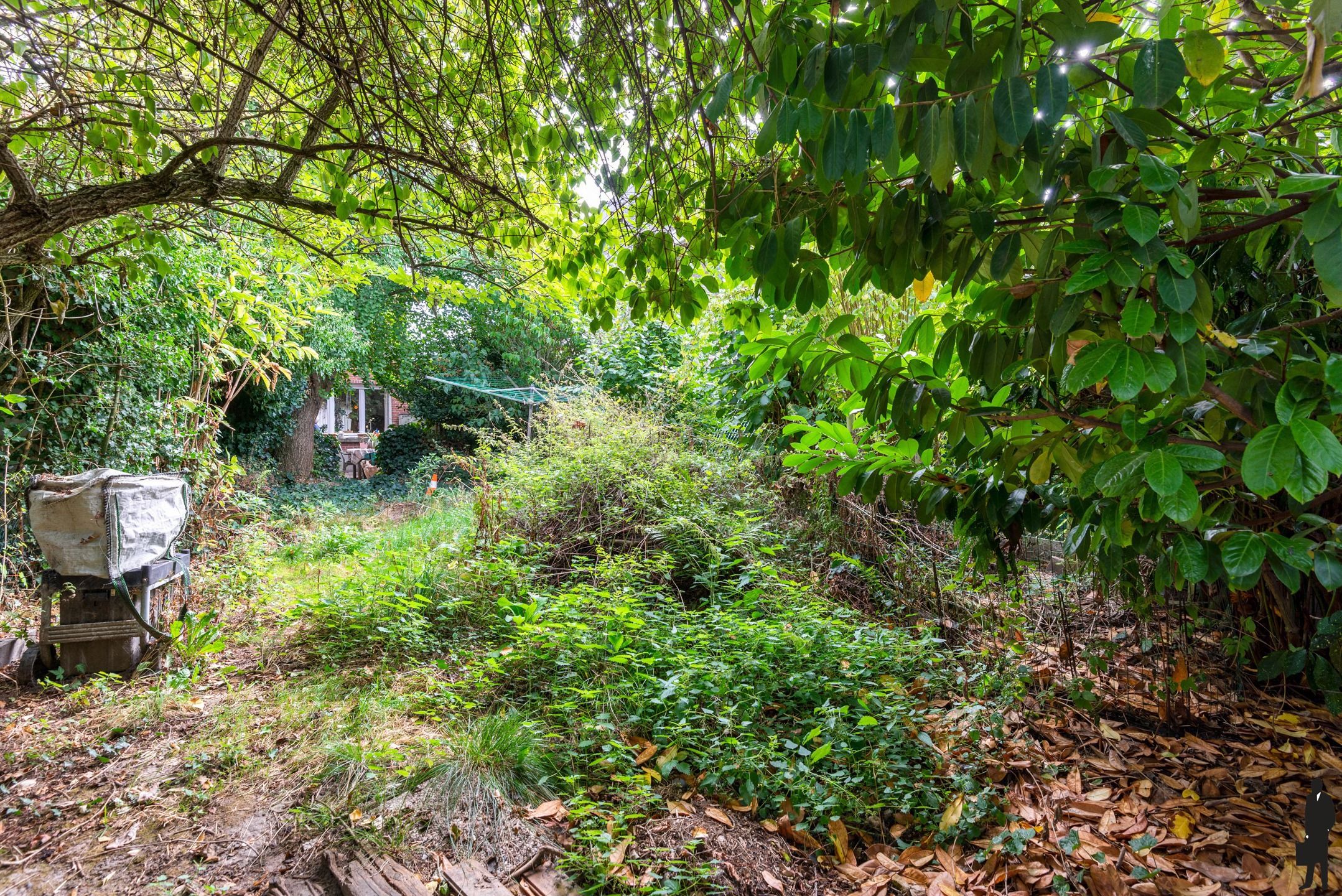 Te renoveren woning met 3 slpks in het hartje van Aartselaar foto 4