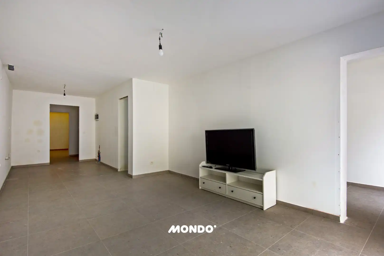 Commercieel gelegen opbrengsteigendom met handelsgelijkvloers, appartement en studio in het centrum van Willebroek! foto 7