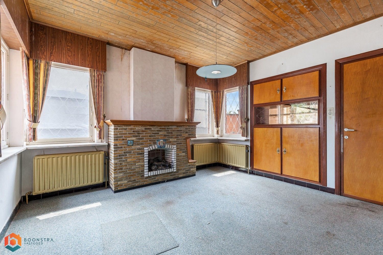 Te renoveren woning met tuin en 2 slpkrs op een perceel van 664 m² foto 4