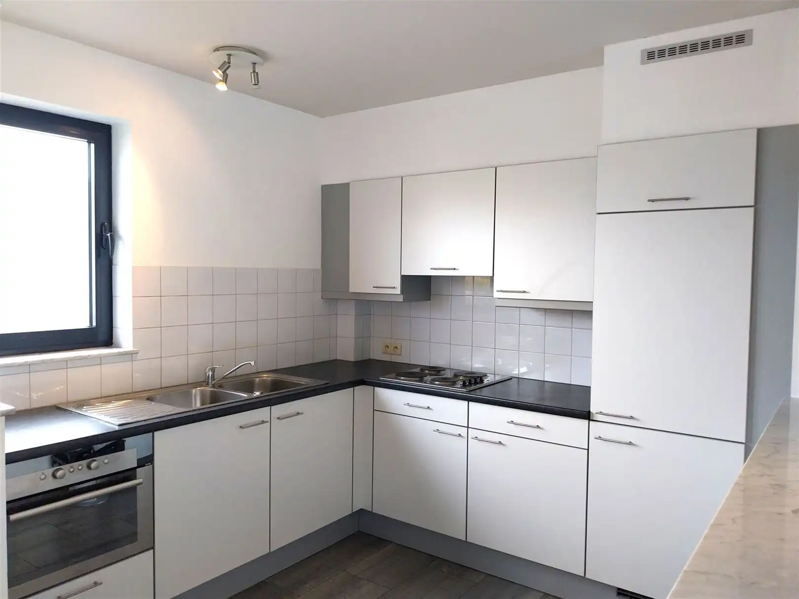 TE HUUR: Gelijkvloers appartement met 3 slaapkamers in Heusden-Zolder! foto 7
