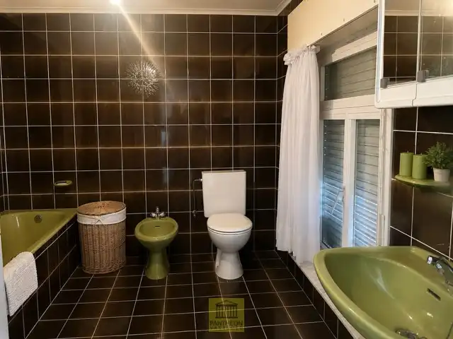 Woning met grote tuin en garage foto 7