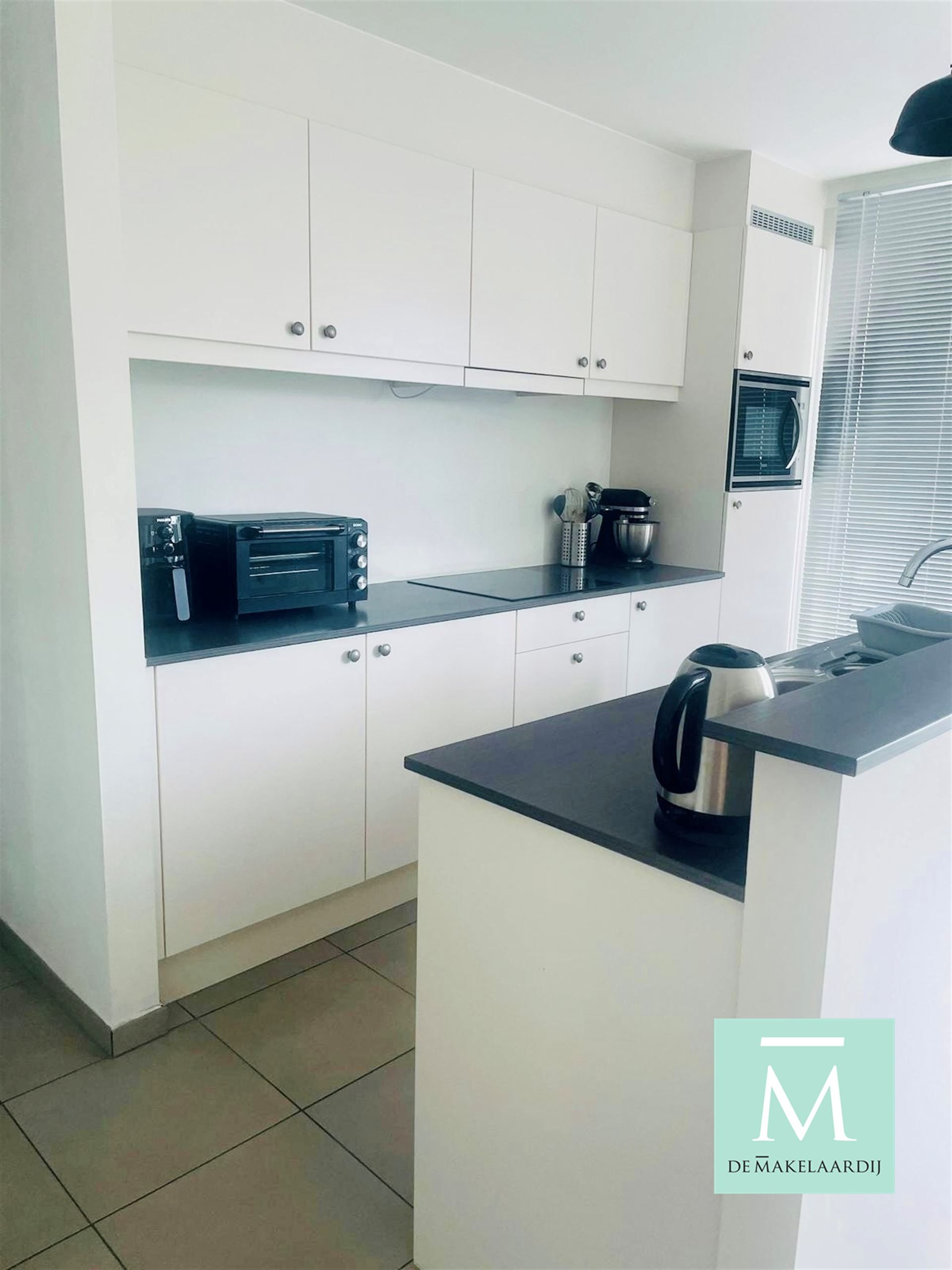 Uitstekend gelegen appartement met 2 slaapkamers in het centrum van Onze-Lieve-Vrouw-Waver foto 3