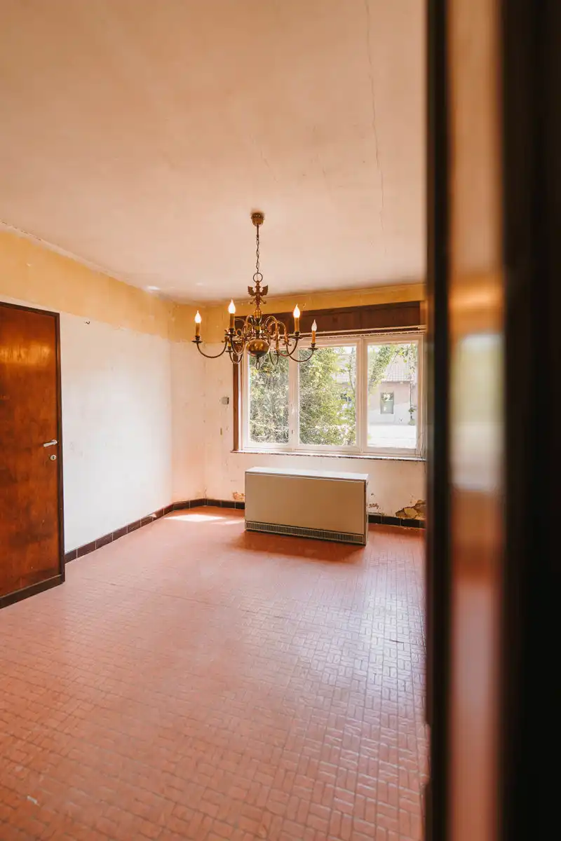 Gezellige, te renoveren open woning in een rustige straat foto 7
