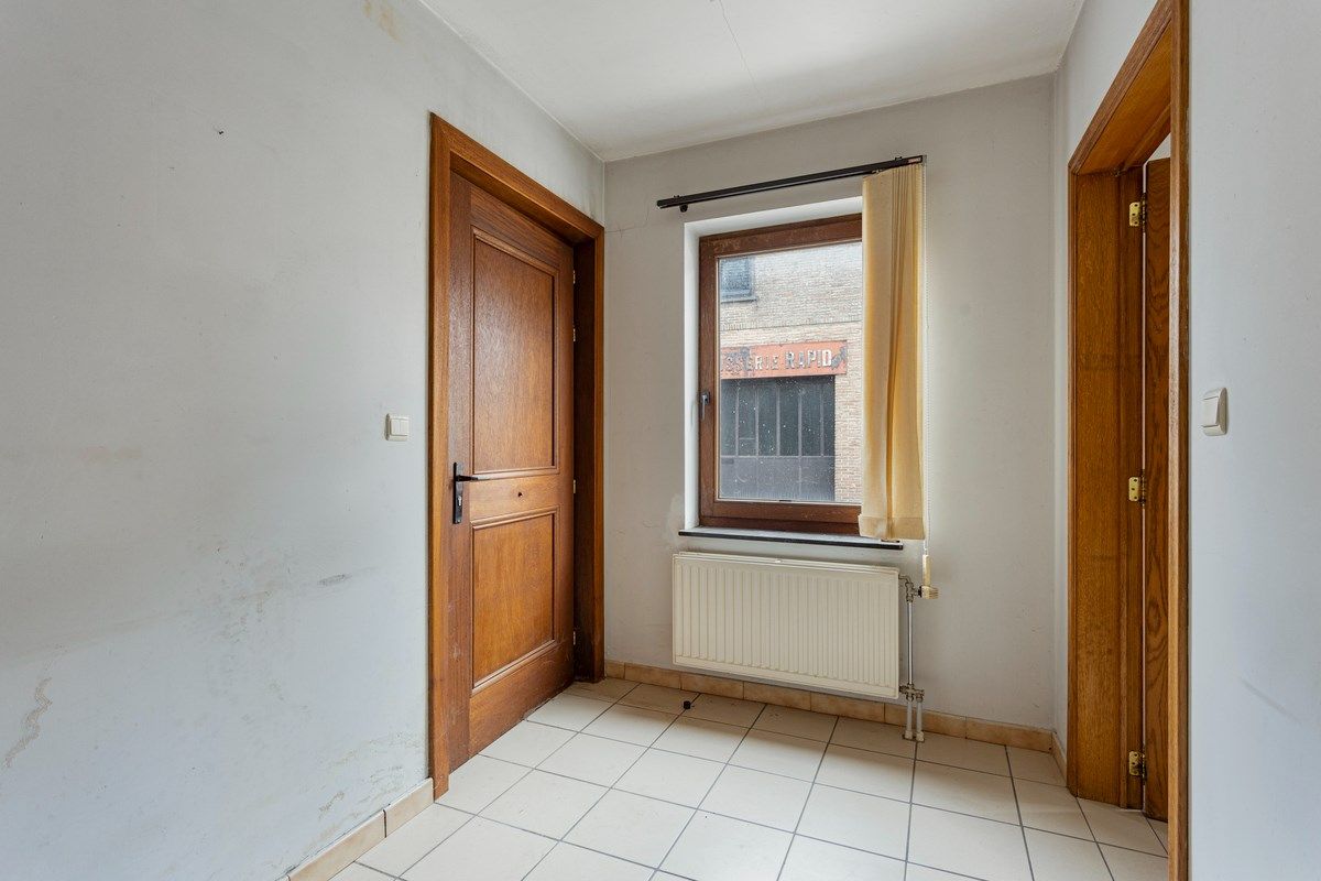 Grote woning in Tongeren centrum met ruimte voor burelen of praktijk foto 14