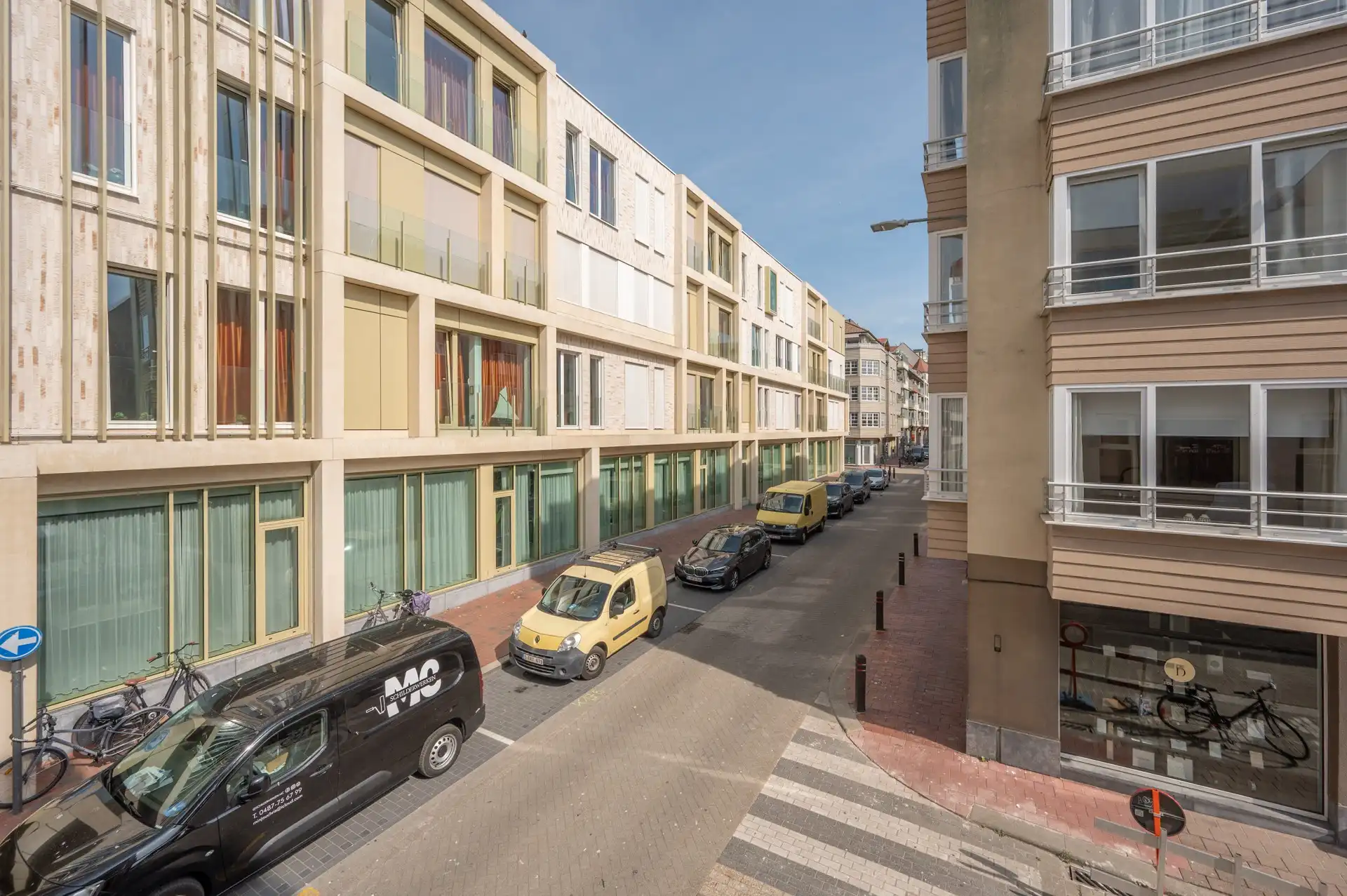 Volledig vernieuwde opbrengsteigendom met drie appartementen en verhuurd handelsgelijkvloers foto 11