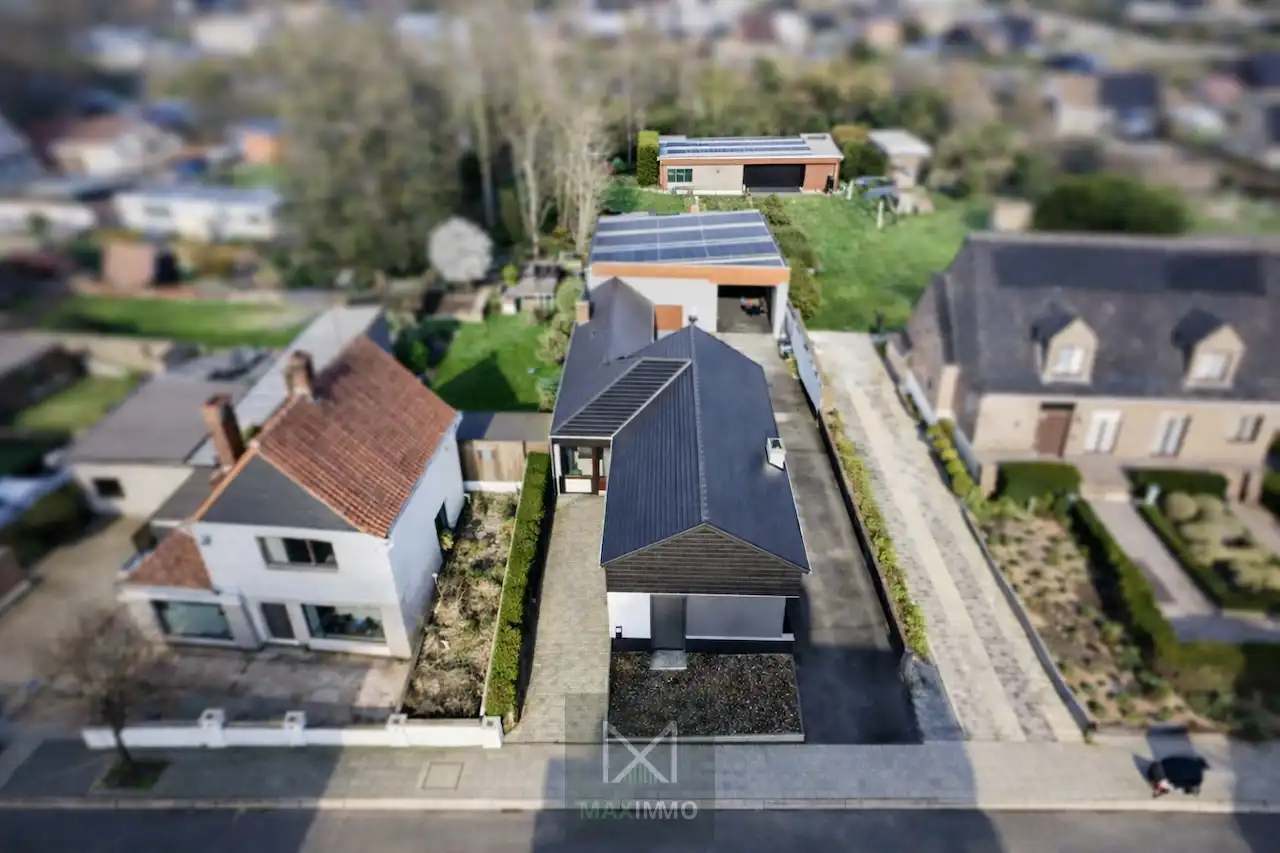 Gelijkvloerse bungalow met loods van 180 m² in het centrum van Marke foto 30