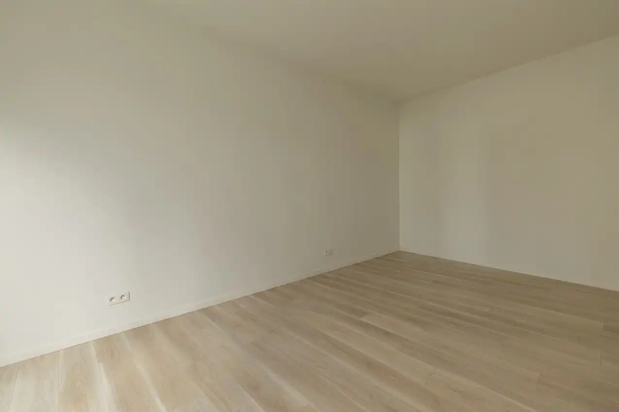 Nieuwbouwappartement met 1 slpk, autostaanplaats en terras foto 8