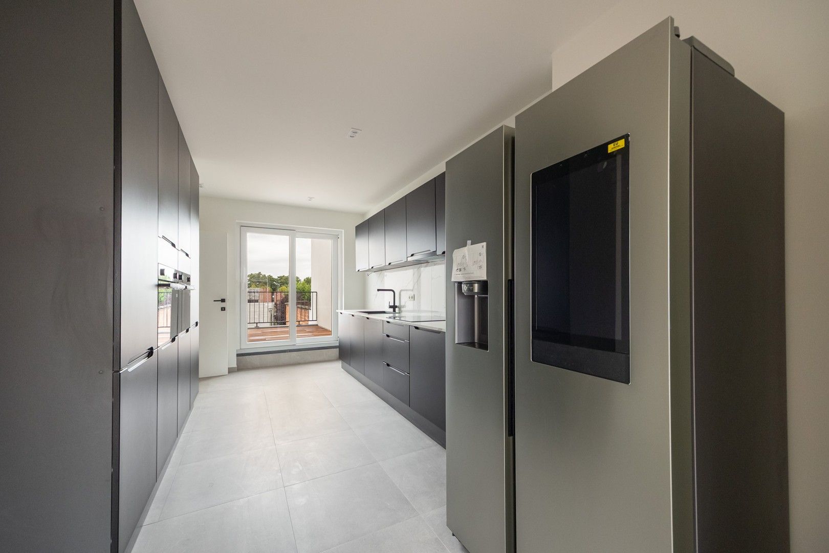 DUPLEXAPPARTEMENT+TERRAS foto {{pictureIndex}}