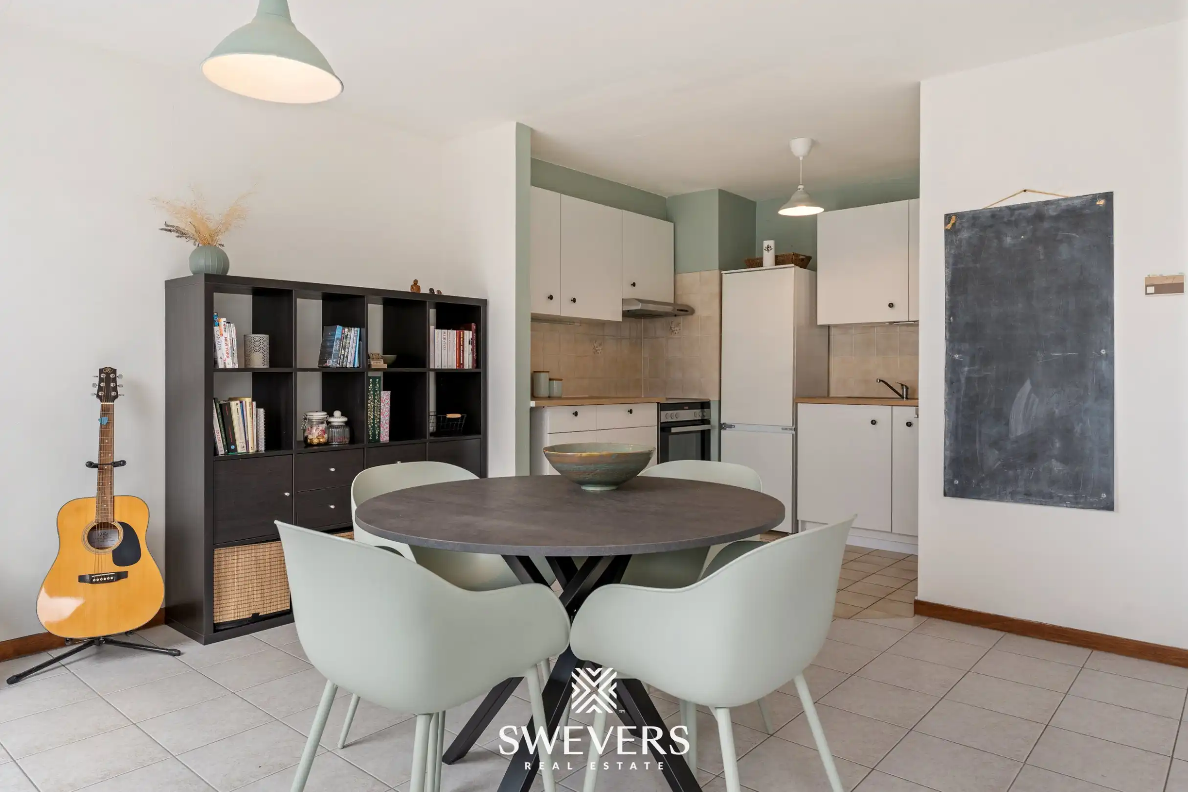 Instapklaar en lichtrijk 1-slaapkamerappartement op topligging in Houthalen centrum foto 8