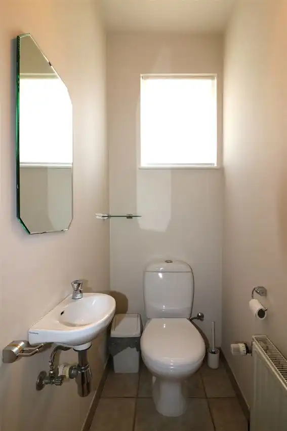 Gusting gelegen woning met 3 slp, garage en tuin foto 13