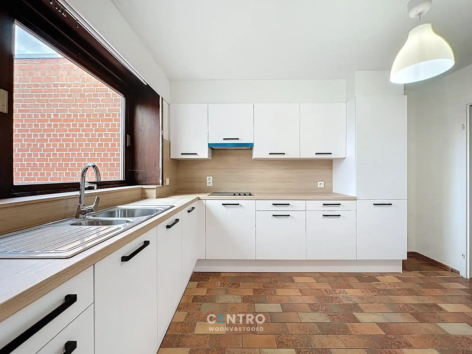 Betaalbaar app. (85m²) met 2 slpks, kelderberging en TERRAS van 50m² ! foto 3